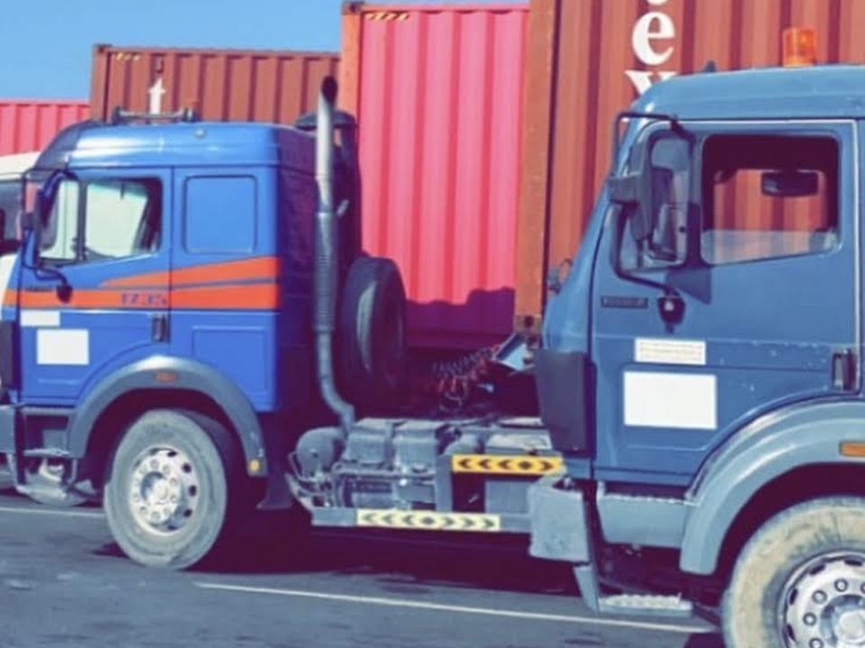 East Star tractor units with shipping containers near Jebel Ali Port